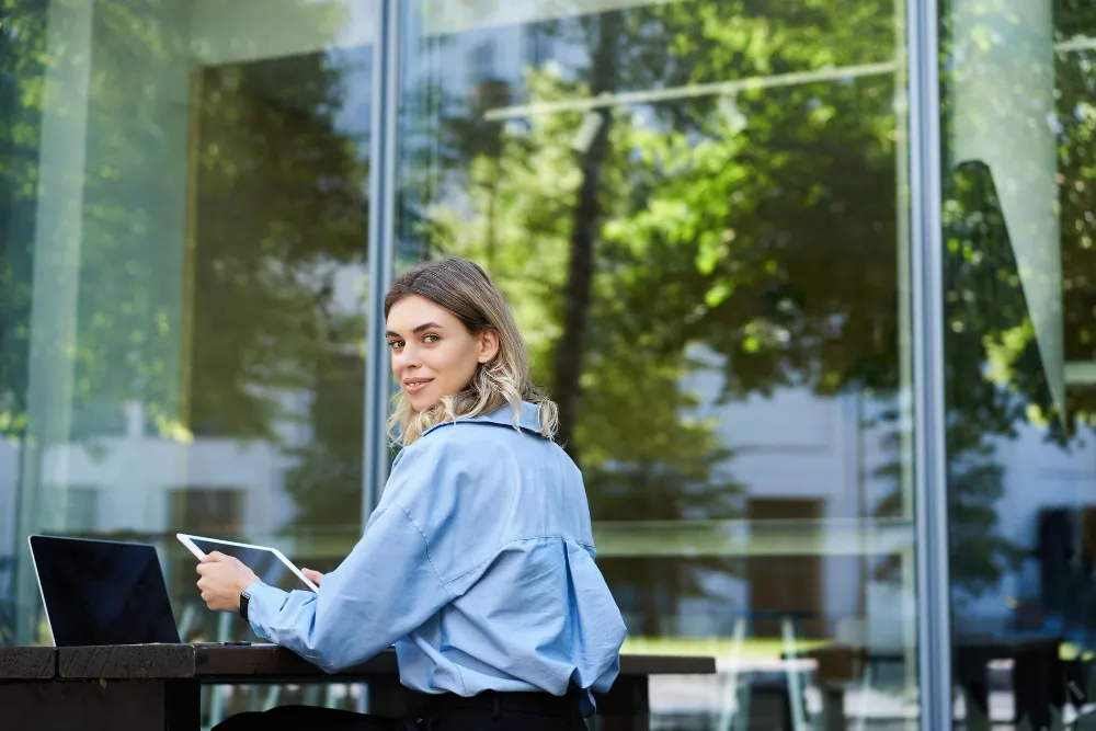 Confidence coaching for a neurodivergent professional working calmly by a London office window